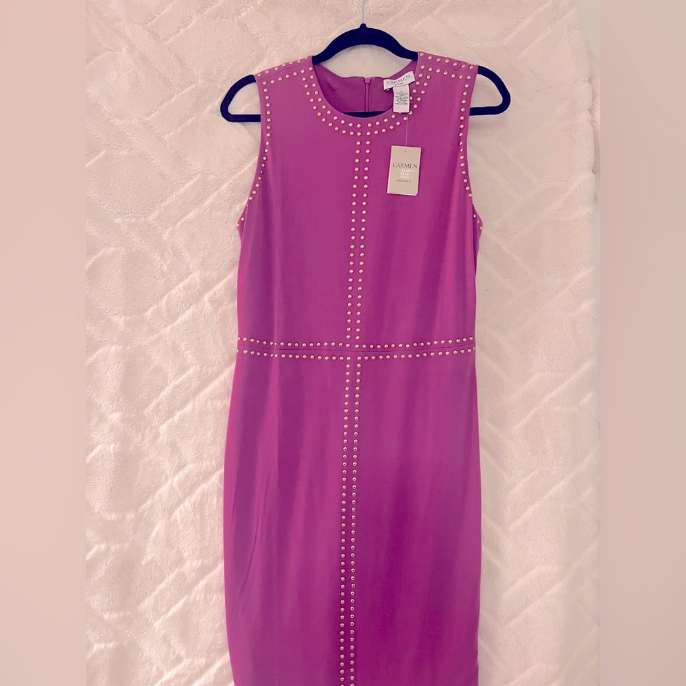 Beautiful and sexy dress.  Stunning color gold embellishments.New with tags.